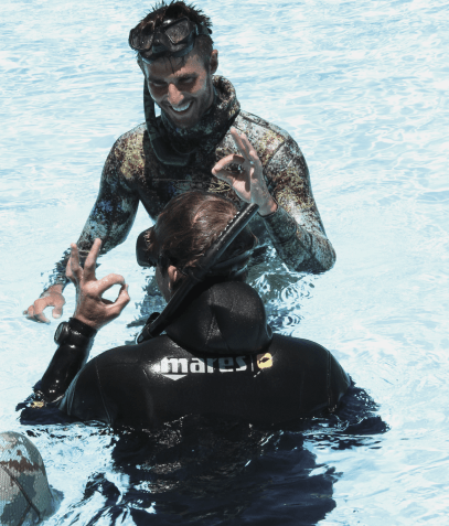 Freediver signals okay during training